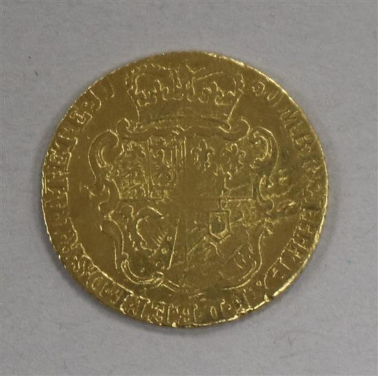 A gold copy of a George II half guinea, 1750, 4.1g
